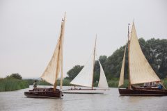 Three sail boats tacking