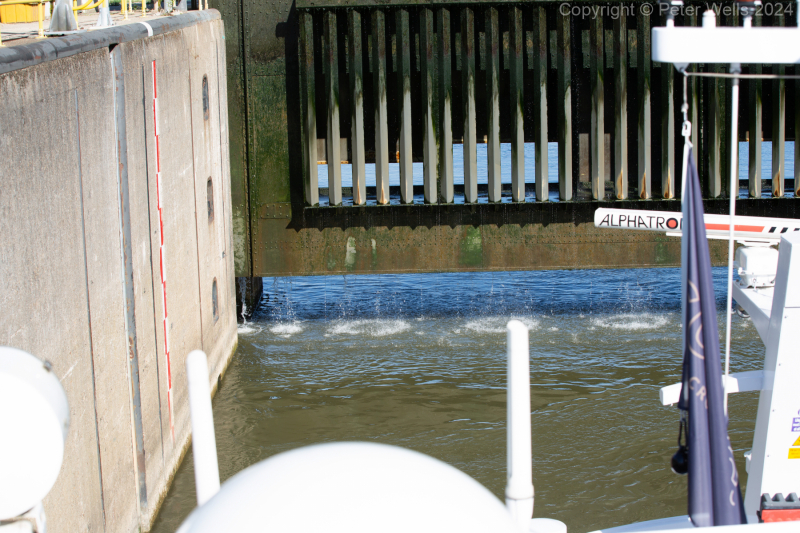 The upper gate opens